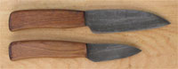Finished (except for the rivits and final sharpening) prototypes of the 4 inch and the 2 1/2 inch double forged knives.