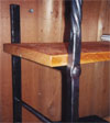 detail for iron bookshelf supports