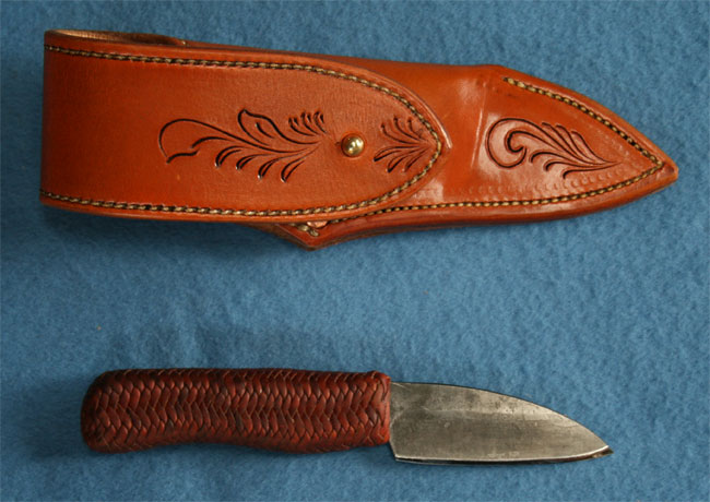 Rawhide braided onto handle of North Bay Forge Bushcraft knife